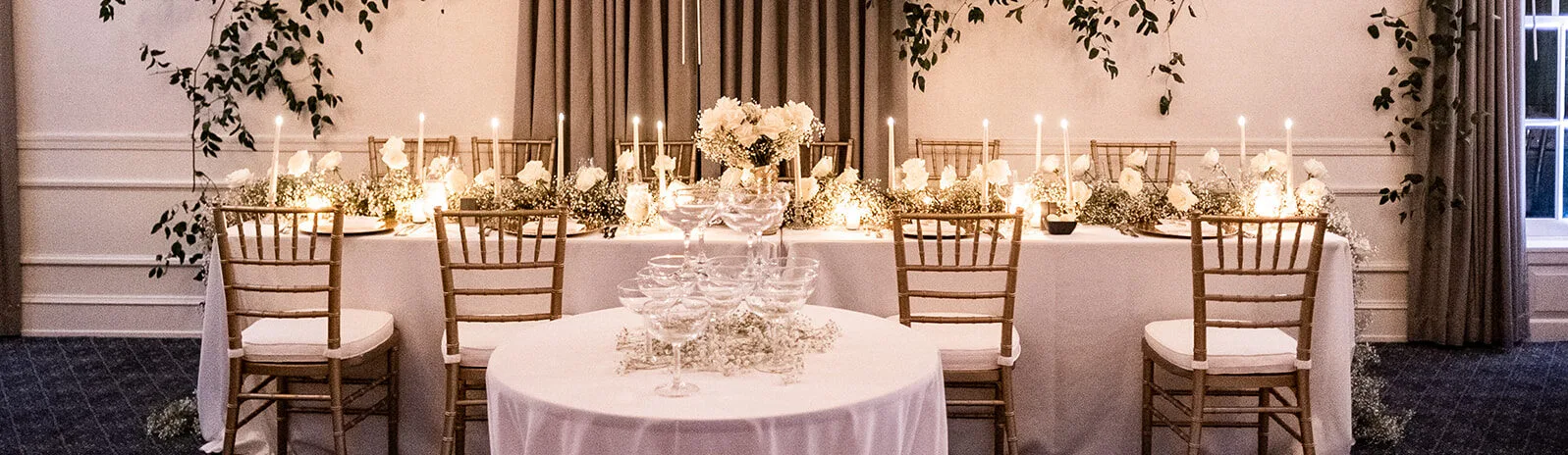 Wedding reception tables set up in the Watermark ballroom